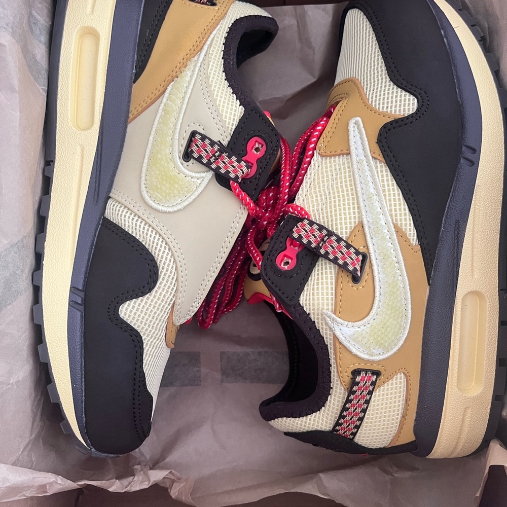 Nike X Cactus Jack: Red, brown, beige, and caramel color scheme. Super dope!